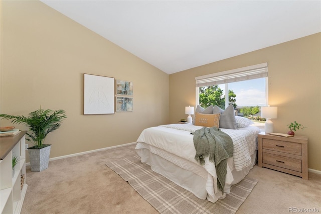 12814 Forest Cir, Thornton, CO 80241 - bedroom with light carpet, vaulted ceiling, and baseboards