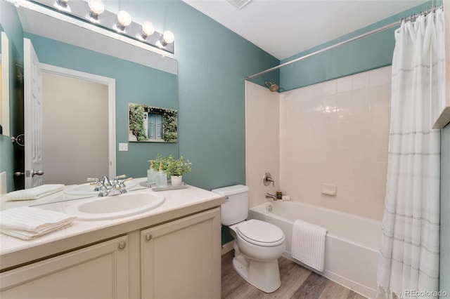 12814 Forest Cir, Thornton, CO 80241 - full bath with toilet, wood finished floors, shower / bath combination with curtain, and vanity