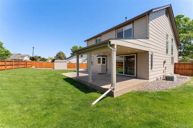 12814 Forest Cir, Thornton, CO 80241 - rear view of property with a patio and central air condition unit