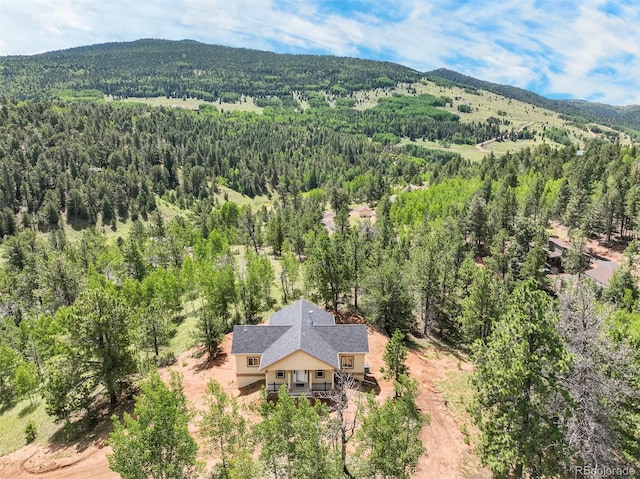 birds eye view of property with a mountain view