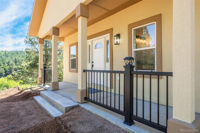 property entrance with a porch