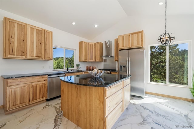 kitchen with a kitchen island, decorative light fixtures, wall chimney exhaust hood, stainless steel appliances, and vaulted ceiling