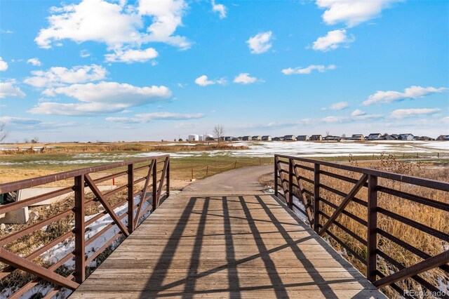 view of dock featuring a rural view