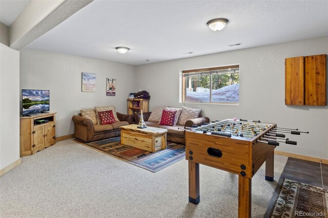 game room with baseboards and visible vents