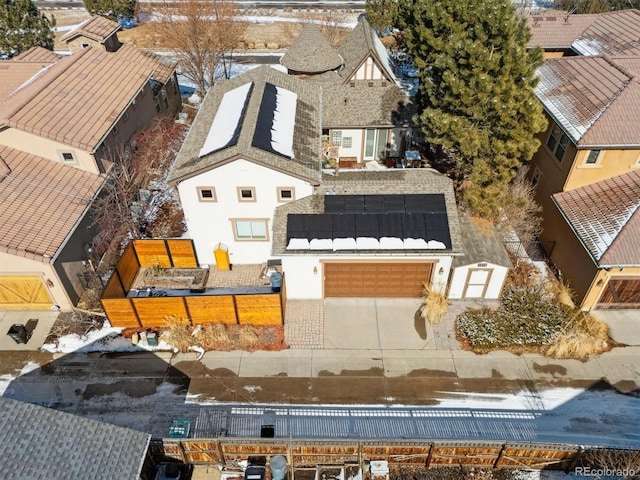 birds eye view of property with a residential view