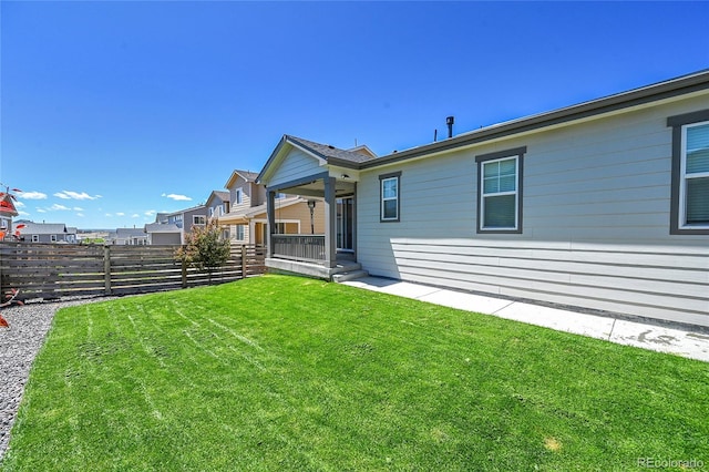 4040 Eaton Park St, Aurora, CO 80019 - view of yard featuring a porch