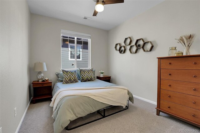 4040 Eaton Park St, Aurora, CO 80019 - bedroom with light colored carpet, baseboards, and ceiling fan