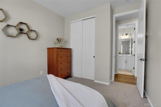 4040 Eaton Park St, Aurora, CO 80019 - carpeted bedroom featuring a closet and baseboards