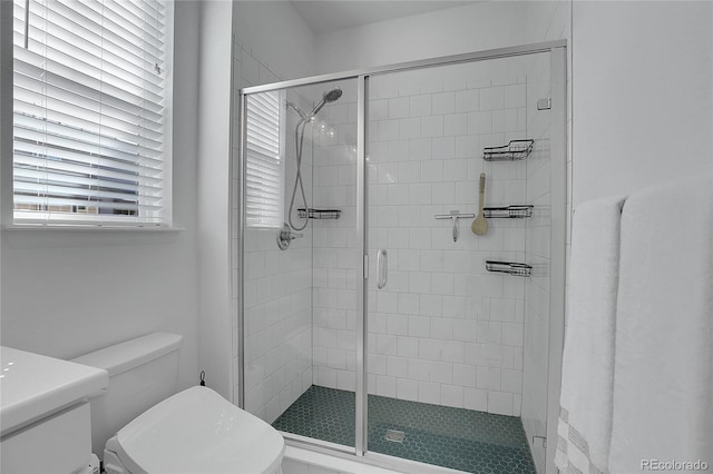 4040 Eaton Park St, Aurora, CO 80019 - full bath featuring toilet, a stall shower, and vanity