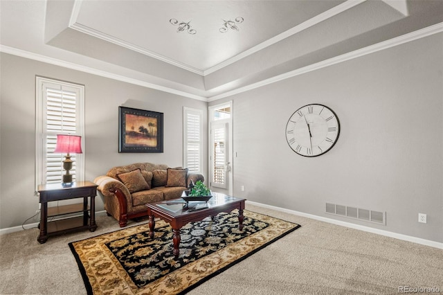 3188 Lynwood Ave, Highlands Ranch, CO 80126 - living area featuring a raised ceiling, carpet, baseboards, visible vents, and ornamental molding