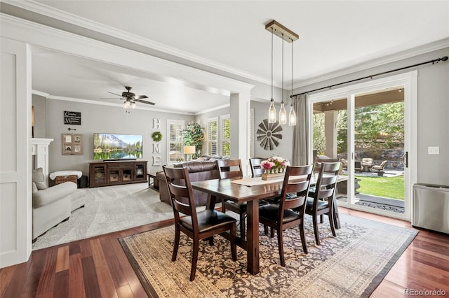 3188 Lynwood Ave, Highlands Ranch, CO 80126 - dining space with crown molding, a ceiling fan, and hardwood / wood-style floors