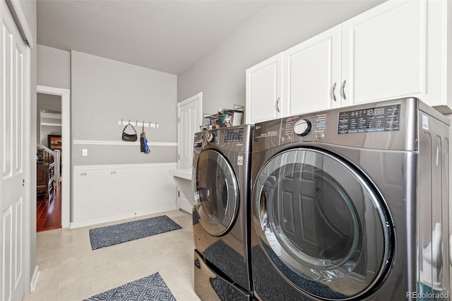 3188 Lynwood Ave, Highlands Ranch, CO 80126 - washroom with cabinet space and washing machine and clothes dryer