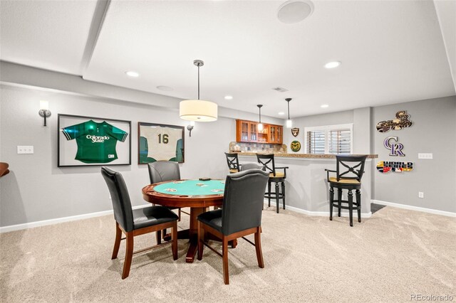 3188 Lynwood Ave, Highlands Ranch, CO 80126 - dining room featuring recessed lighting, baseboards, light colored carpet, and bar area
