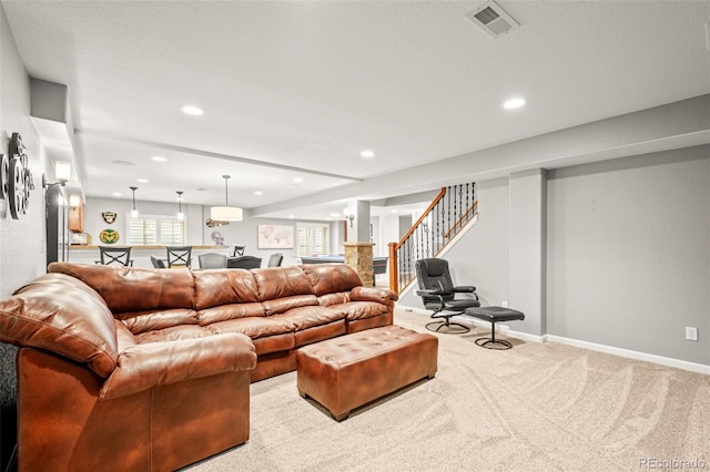 3188 Lynwood Ave, Highlands Ranch, CO 80126 - carpeted living area featuring stairway, baseboards, recessed lighting, and visible vents