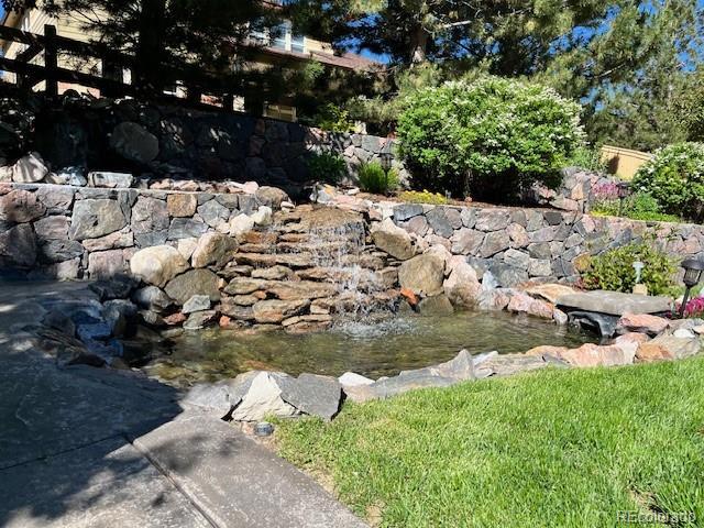 3188 Lynwood Ave, Highlands Ranch, CO 80126 - view of yard with a small pond