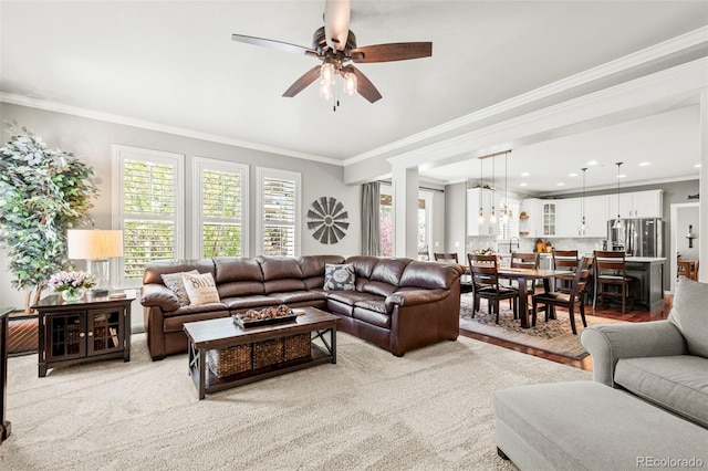 3188 Lynwood Ave, Highlands Ranch, CO 80126 - living room with ornamental molding, light carpet, recessed lighting, and ceiling fan