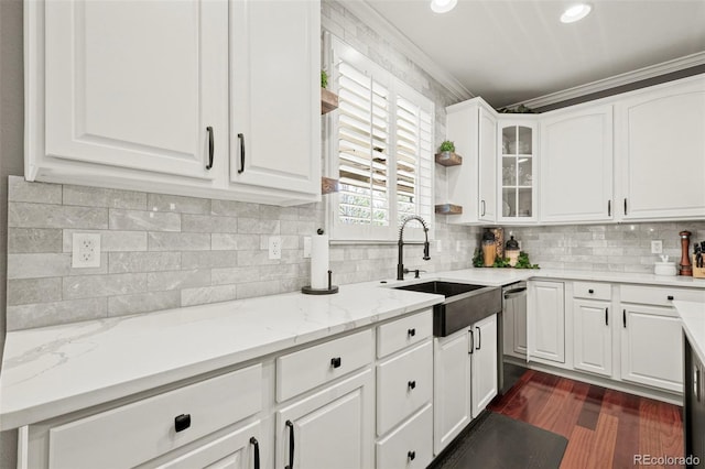 3188 Lynwood Ave, Highlands Ranch, CO 80126 - kitchen featuring white cabinets, a sink, dishwasher, dark wood-type flooring, and glass insert cabinets