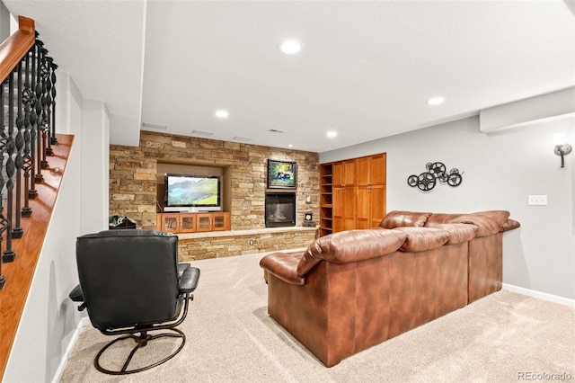 3188 Lynwood Ave, Highlands Ranch, CO 80126 - carpeted living area featuring baseboards, recessed lighting, stairs, and a fireplace