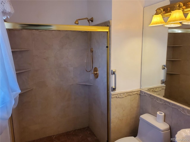 bathroom featuring tile walls, a shower with door, and toilet