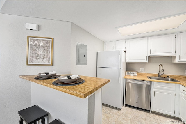 kitchen with stainless steel dishwasher, sink, white refrigerator, white cabinets, and electric panel