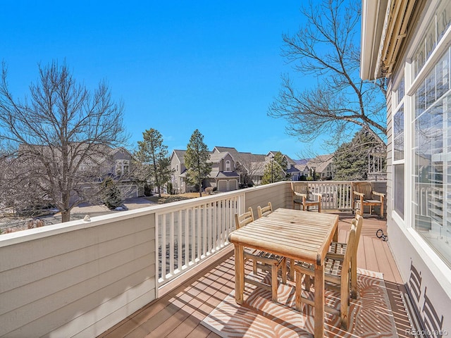 8312 S Peninsula Dr, Littleton, CO 80120 - deck featuring a residential view and outdoor dining area