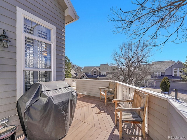 8312 S Peninsula Dr, Littleton, CO 80120 - deck with area for grilling and a residential view