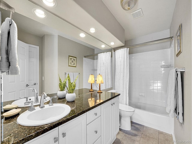 8312 S Peninsula Dr, Littleton, CO 80120 - bathroom with recessed lighting, vanity, toilet, and shower / bathtub combination with curtain