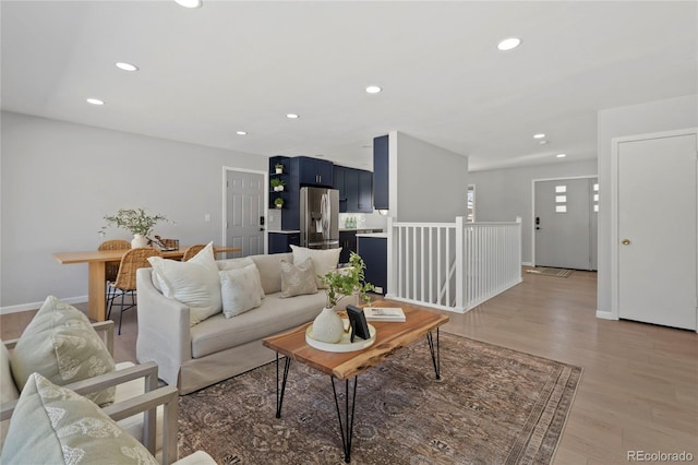 living room featuring light wood-type flooring