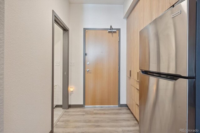 doorway featuring light hardwood / wood-style flooring