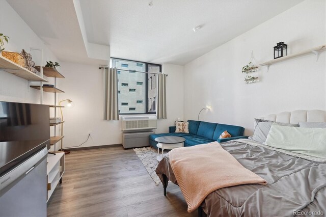 bedroom featuring light wood-type flooring