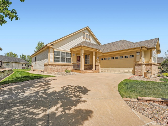 ranch-style house with brick siding, a garage, concrete driveway, and a front yard