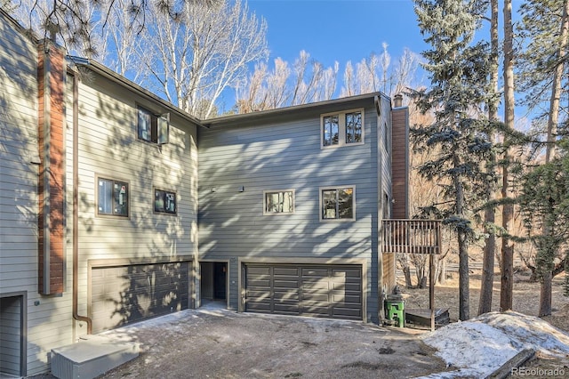 exterior space with a garage