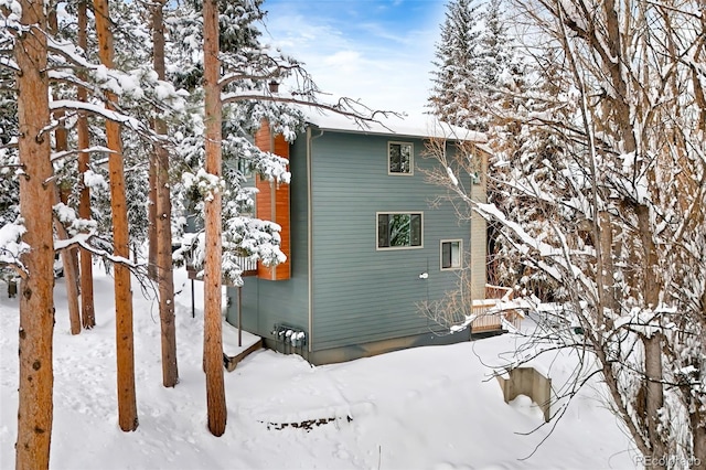 view of snow covered property