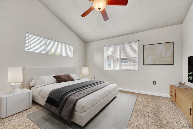 3261 S Waco Ct Unit C, Aurora, CO 80013 - bedroom with multiple windows, vaulted ceiling, baseboards, and ceiling fan