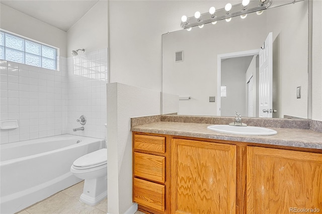 3261 S Waco Ct Unit C, Aurora, CO 80013 - full bathroom with tile patterned floors, vanity, toilet, and tub / shower combination