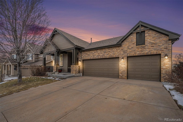 view of front of property with a garage