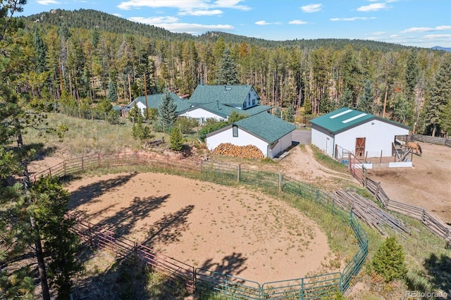 birds eye view of property featuring a rural view