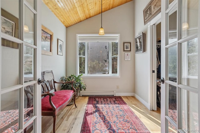 sunroom featuring wood ceiling, a baseboard heating unit, lofted ceiling, and french doors