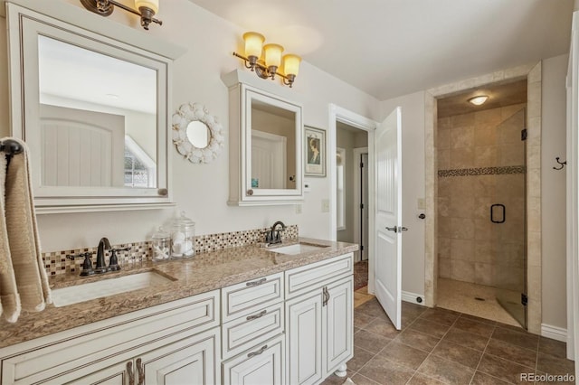 bathroom featuring vanity, tile patterned floors, and walk in shower