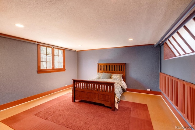 bedroom featuring a textured ceiling