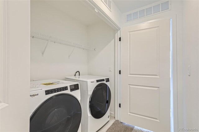348 N Geneva St, Aurora, CO 80010 - laundry area featuring washing machine and dryer
