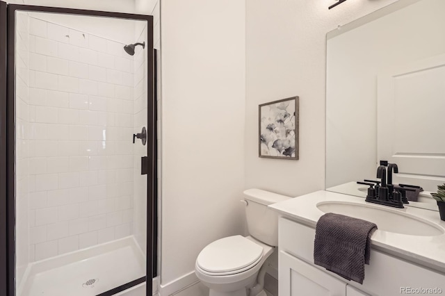 348 N Geneva St, Aurora, CO 80010 - bathroom featuring a shower stall, toilet, and vanity