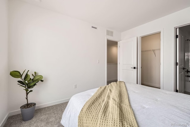 348 N Geneva St, Aurora, CO 80010 - carpeted bedroom with baseboards
