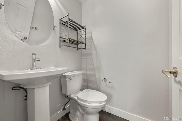 280 Granby Way Unit C, Aurora, CO 80011 - bathroom with baseboards and wood finished floors