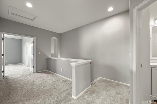 280 Granby Way Unit C, Aurora, CO 80011 - hall featuring carpet flooring, attic access, an upstairs landing, and recessed lighting