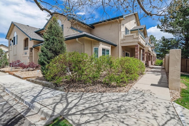 8757 E Dry Creek Rd Unit 1512, Englewood, CO 80112 - view of property exterior with stucco siding