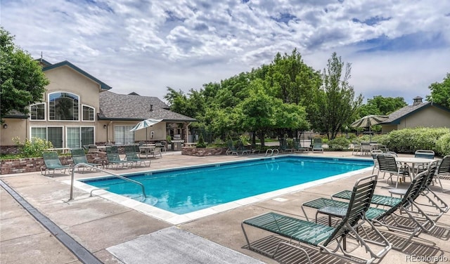 8757 E Dry Creek Rd Unit 1512, Englewood, CO 80112 - community pool featuring a patio area