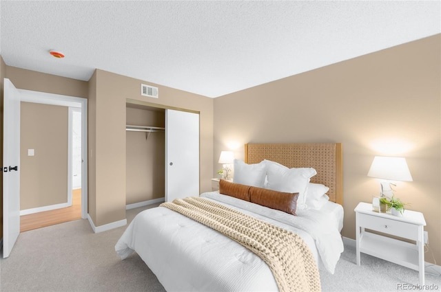 921 S Walden St Unit 205, Aurora, CO 80017 - carpeted bedroom with a closet and baseboards