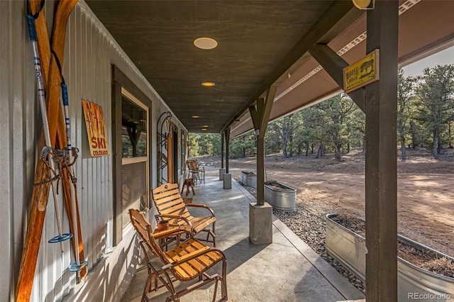 view of patio featuring a porch