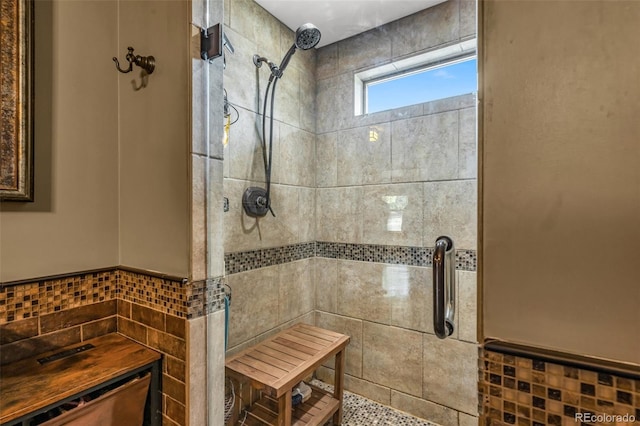 bathroom featuring a tile shower